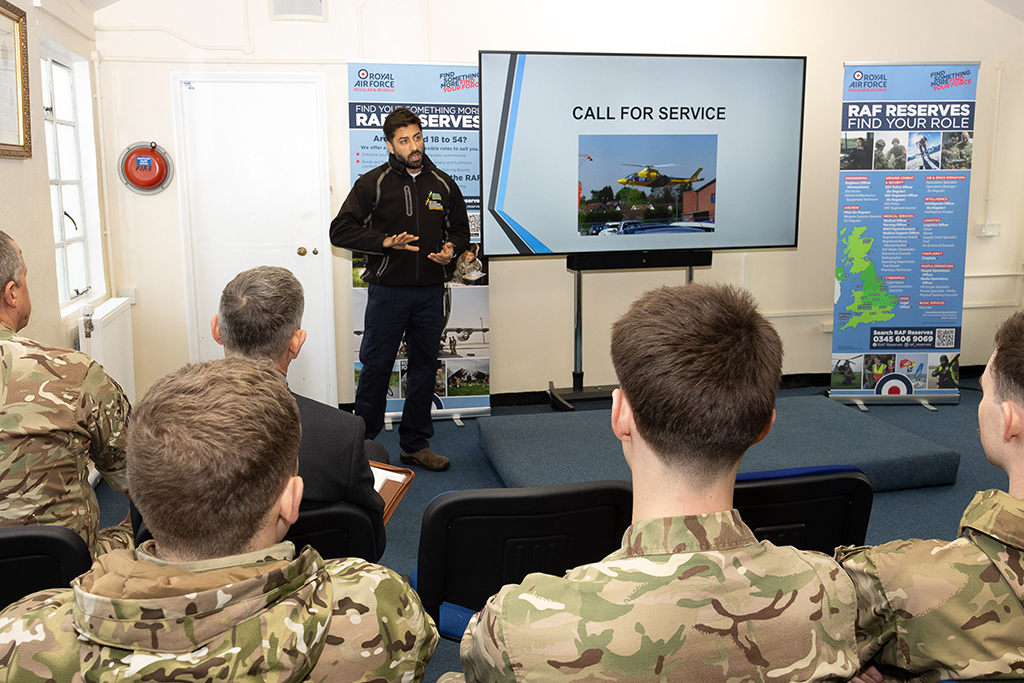 An Air Specialist delivers a Safety Week brief to the gathered audience